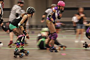  Women playing roller derby 