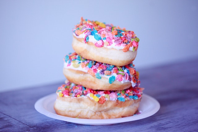 Colorful fruity pebbles donuts