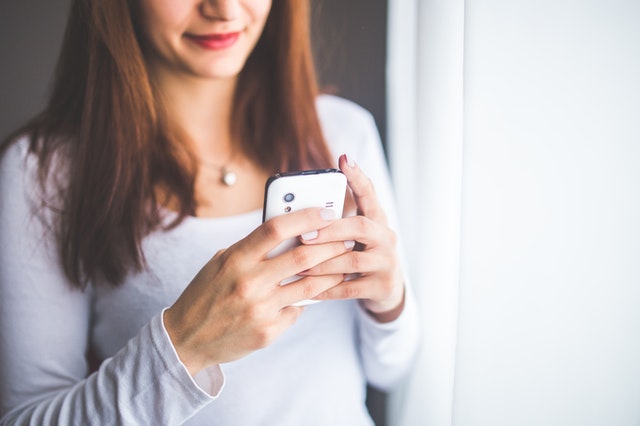 Woman looking at mobile phone